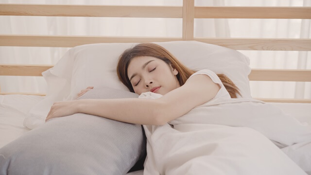 asian-woman-dreaming-while-sleeping-bed-bedroom