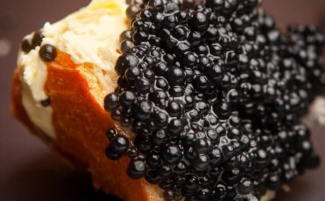 set-butter-black-caviar-bread-dark-background-high-angle-view